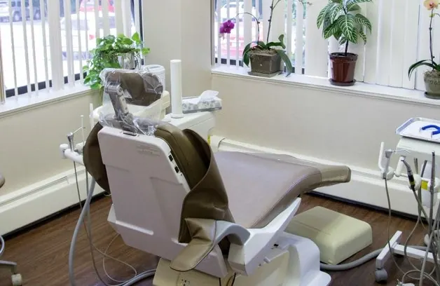 A treatment room at the practice, with windows on two sides.